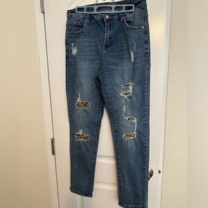 Leopard print patchwork, distressed jeans. Size L